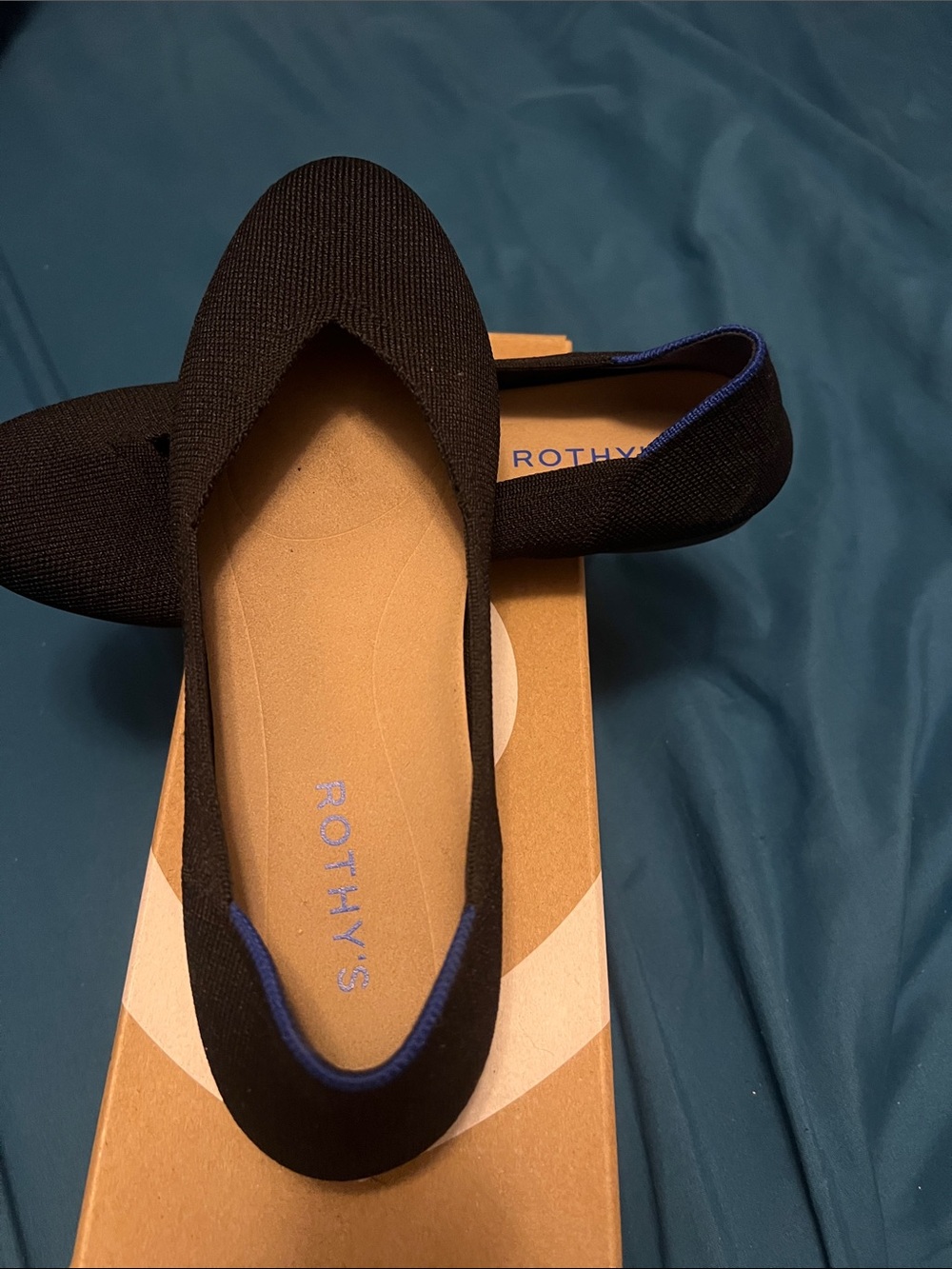 Rothy's Black Pointed Knit Flat with Blue Trim